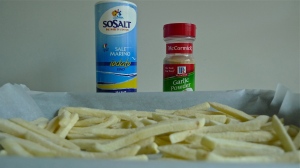 Season French Fries/Chips with Salt and optional Garlic Powder